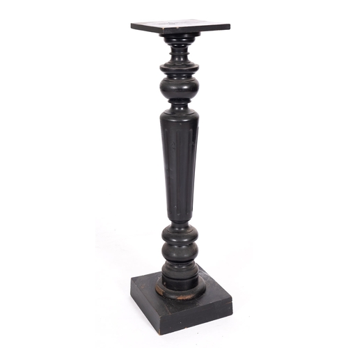 961 - A Victorian ebonised wood pedestal, late 19th century; with square platform above a multi-knopped, t... 