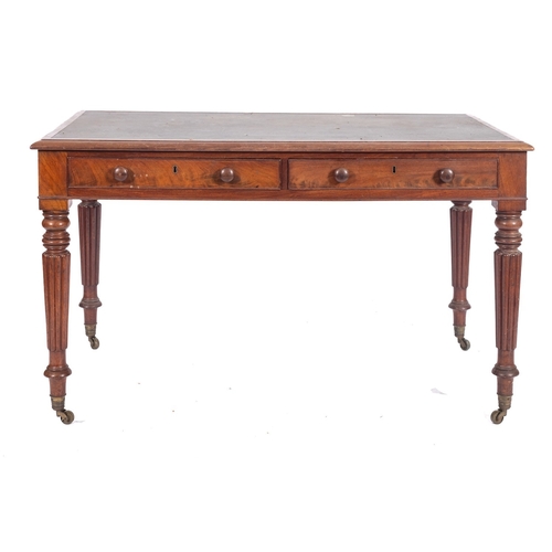 967 - A Victorian mahogany rectangular library writing table, the top inset with a panel of simulated leat... 