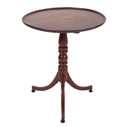 973 - A mahogany night table in late 18th century taste, late 19th century; the top with three quarter wav... 