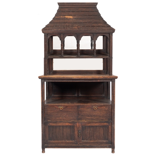 977 - An oak dresser in Arts & Crafts style, circa 1900; the pagoda canopy top modelled resembling slates,... 