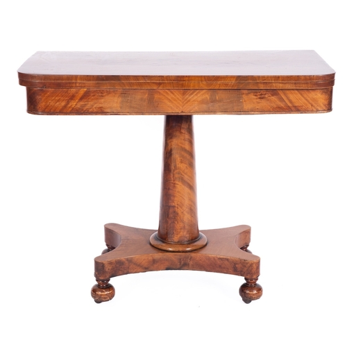 979 - A Victorian mahogany rectangular card table, the baize lined hinged top with rounded corners, on tur... 