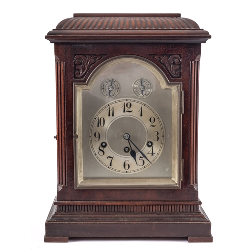 481 - Junghans, Wurttenberg, an oak mantel clock having an eight-day duration movement chiming the quarter... 