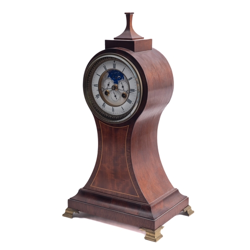 465A - A balloon shaped late-Victorian mahogany moonphase mantel clock having an eight-day duration movemen... 