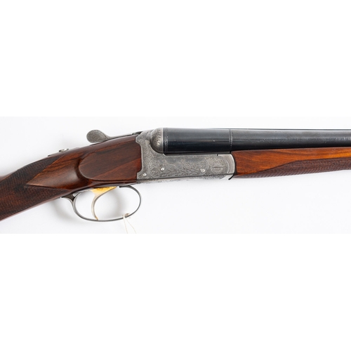 102 - A Fabrica 20 bore s/s shotgun, Serial number 123402, 28 inch barrel, raised rib, box lock action, sc... 