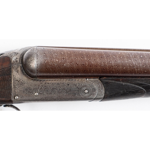 103 - A W.Kavanagh & Son 12 bore. serial number 7761, 30 inch side by side Damascus barrels, scroll engrav... 