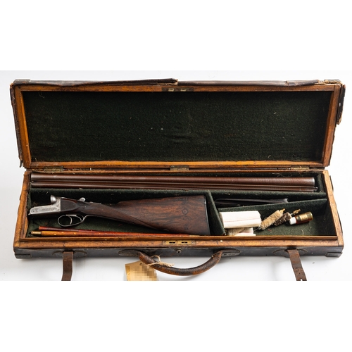 103 - A W.Kavanagh & Son 12 bore. serial number 7761, 30 inch side by side Damascus barrels, scroll engrav... 