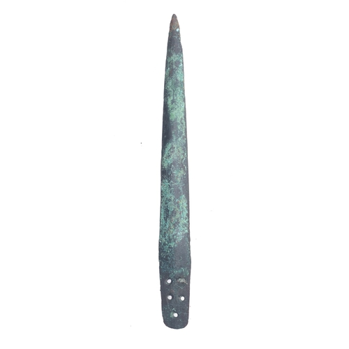 167 - A Bronze Age dagger, the straight double edged blade with six locating holes to tang, 21.5cm long