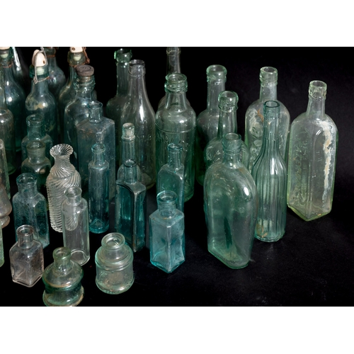 2 - A collection of various glass bottles, various retailers and makers. (a lot)