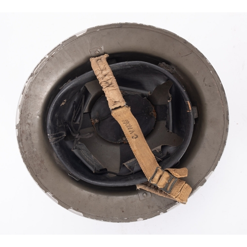 211 - A WWII Royal Navy steel helmet, maker Rubery Owen & Co. Ltd. (Leeds), grey exterior with insignia to... 