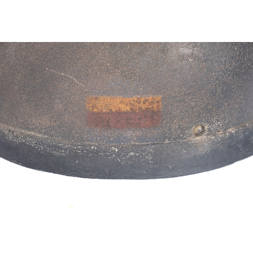 213A - A WWII Fibre rim Airborne Forces/Paratrooper's steel helmet, the exterior with regimental flash to l... 