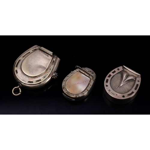 22 - A Victorian silver horseshoe vesta case, maker Hilliard & Thomason, Birmingham 1875, together with t... 