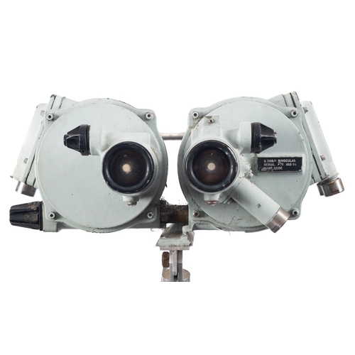 224 - A pair of  G388/1 Military binoculars, serial number 75, mounted on an associated aluminium tripod.