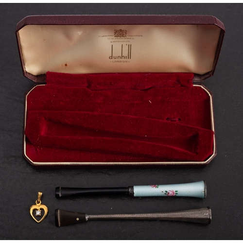 24 - Alfred Dunhill, London. A silver cigarette holder, signed as per title with black mouthpiece , toget... 