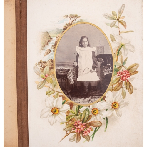 321 - A late 19th/early 20th century Carte de Vistie album, containing family portraits including one of a... 