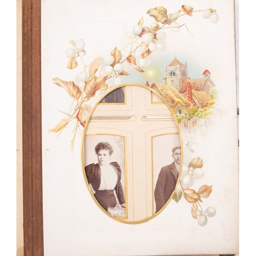 321 - A late 19th/early 20th century Carte de Vistie album, containing family portraits including one of a... 