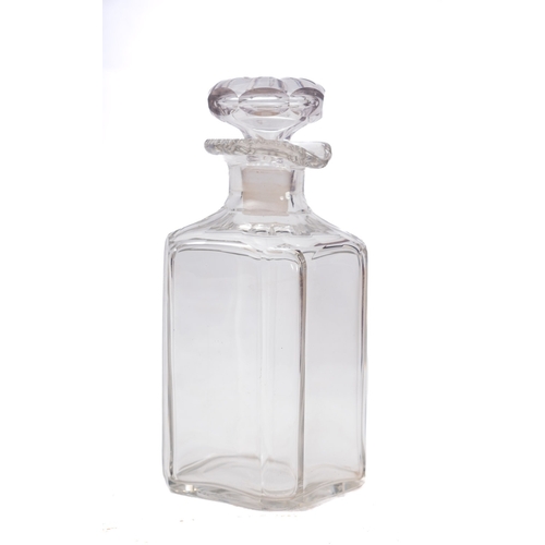 33 - An early 20th century leather cased travelling decanter, the glass decanter in a rectangular case st... 