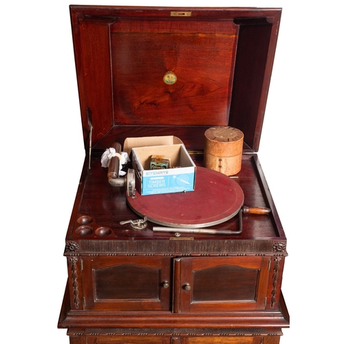 342 - A mahogany cased Pathe gramophone. the pagoda shaped top with bead and sausage moulding enclosing  t... 