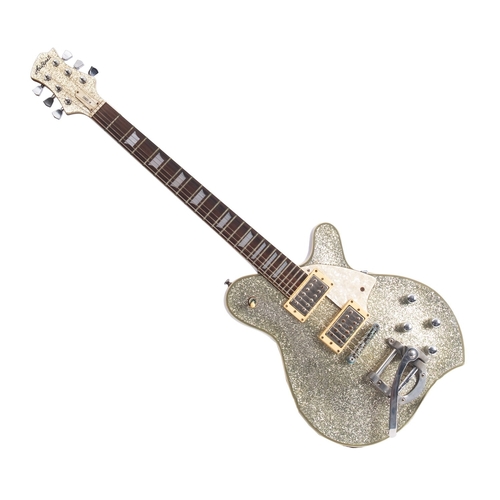 425 - An Aria Pro II M-Series electric guitar, in a silver glitter finish , modified by Mansons Guitars, G... 