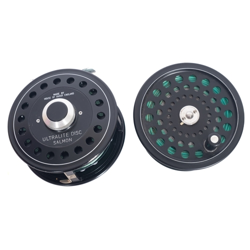 452 - A Hardy 'Ultralite Disc Salmon' 4 inch reel with single winder and dial line tensioner, together wit... 