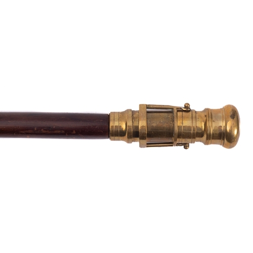 53 - A reproduction brass telescope 'Gadget' stick, 94cm long.