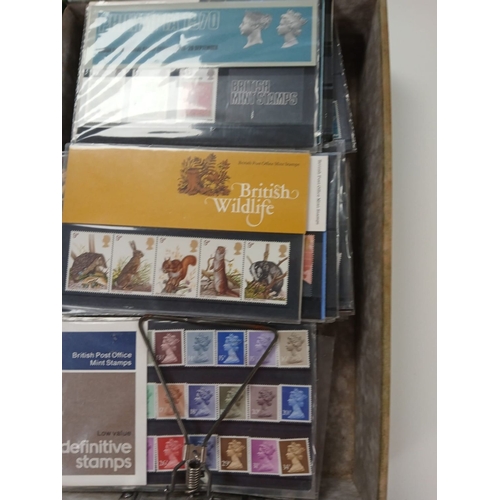 547 - Great Britain stamps, presentation packs, covers, in storage container.