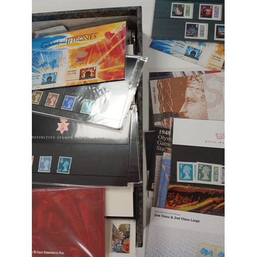 547 - Great Britain stamps, presentation packs, covers, in storage container.