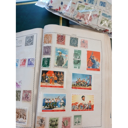 548 - World stamps in albums, on leaves, packets, stockcards, in 2 boxes.