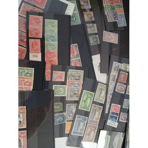 548 - World stamps in albums, on leaves, packets, stockcards, in 2 boxes.