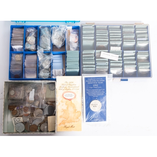 708 - A collection of World coins in packages.