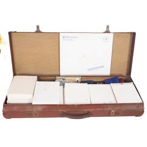 725 - A case containing boxed Royal Mint proof sets, 1983/ 84/ 85/ 80/ 92/ 90/ 91/ 98/ 95/ 89/ 87/ 95/ 96/... 