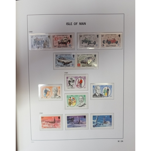 558 - A mint collection of Isle of Man stamps to 2013 in three hingless DAVO albums, also three similar al... 