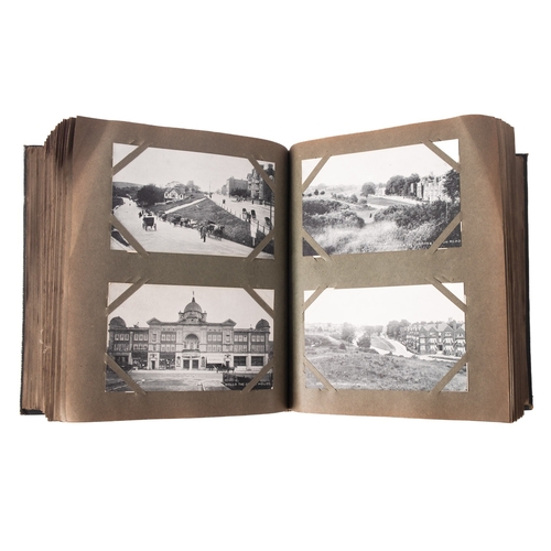 575A - An Edwardian postcard album of GB topographical views, the first two pages with three photograph of ... 