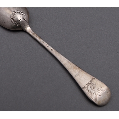 101 - A set of eleven Shell back teaspoons, marks distorted, late 19th century, engraved with a crest of a... 