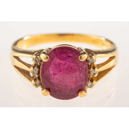 1067 - An 18ct gold ruby and diamond ring, set with an oval-cut ruby and three small brilliant-cut diamonds... 