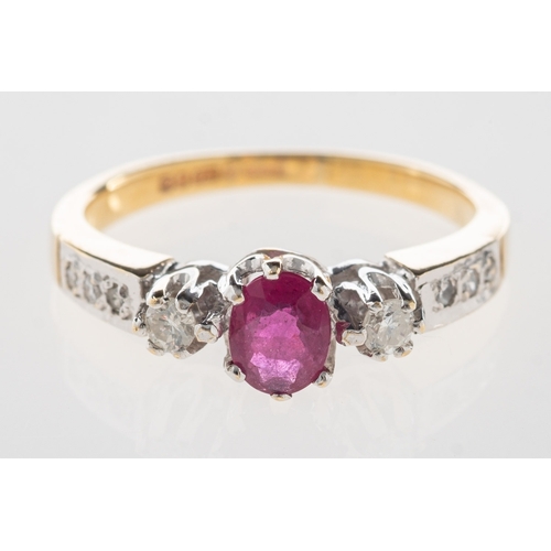 1077 - A 9ct gold ruby and diamond ring, set to the centre with an oval-cut ruby and a brilliant-cut diamon... 