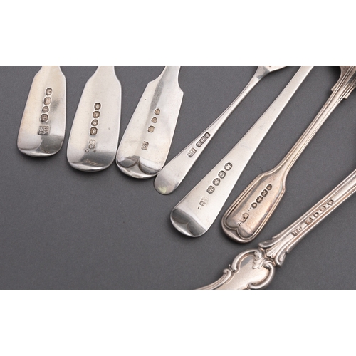 144 - A mixed group of silver flatware including; a matched set of eight Fiddle pattern dessert spoons, va... 