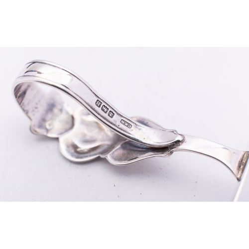 176 - A George V silver child's pusher and spoon by Crisford & Norris Ltd, Birmingham 1926, decorated with... 