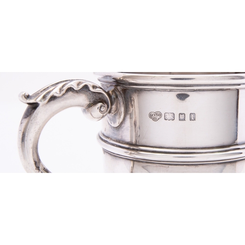 179 - A George V silver cased christening mug by Goldsmiths and Silversmiths Company Ltd, London 1926, in ... 