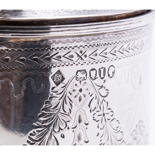 212 - A Victorian silver mustard pot by Richard Martin & Ebenezer Hall, London 1884, of oval form, the dom... 