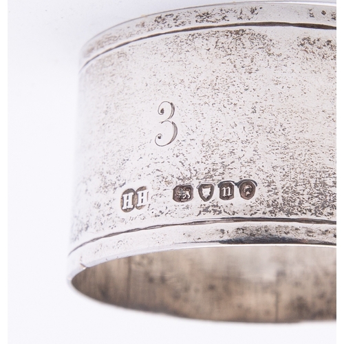 230 - A mixed group of ten silver napkin rings including; a pair of signet ring style by Sampson Mordan & ... 