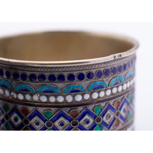 238B - A late 19th century Russian silver and enamel napkin ring marked 88 A.B, decorated with stars and sc... 