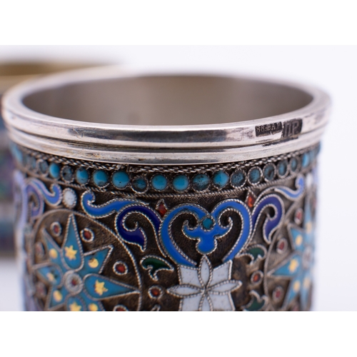 238B - A late 19th century Russian silver and enamel napkin ring marked 88 A.B, decorated with stars and sc... 