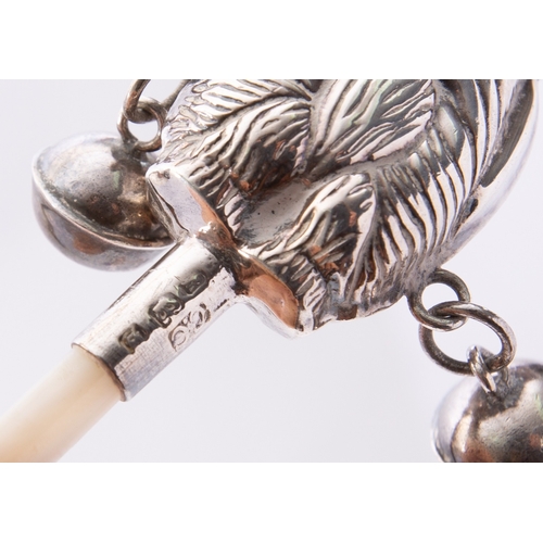 265 - A mixed group of modern silver and mother of pearl baby rattles including; a duck wearing a policema... 