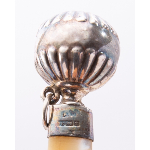 267 - A mixed group of silver and mother of pearl baby rattles; including two dumb bell rattles, five with... 