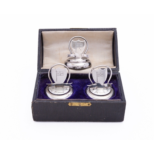 283 - Royal Navy Interest: a cased pair Edward VII silver of menu holders by George Unite, Birmingham 1910... 