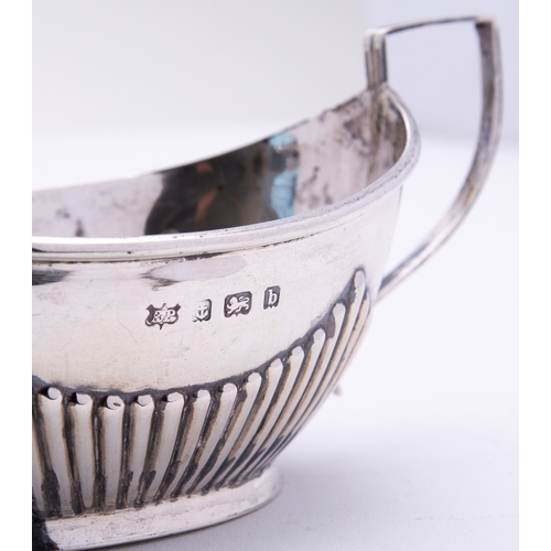 30 - A mixed group of silver including; a two handled sugar bowl and matching cream jug Birmingham 1890, ... 