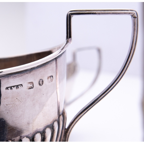 30 - A mixed group of silver including; a two handled sugar bowl and matching cream jug Birmingham 1890, ... 