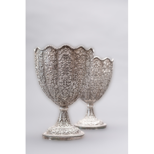 304 - A pair of late 19th century Indian Kutch silver standing cups or goblets marked W&O, probably Luckno... 