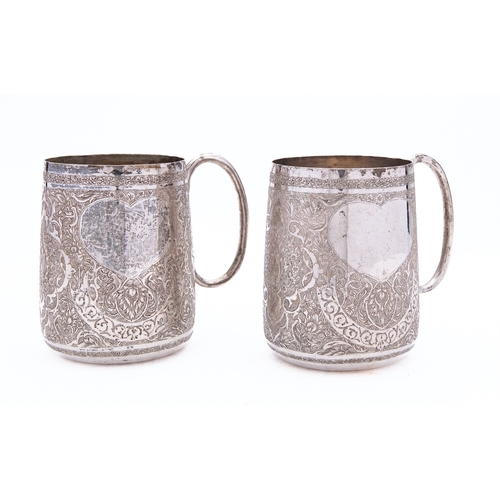 326 - A pair of early 20th century Iranian silver mugs, three marks to base, inverted tapering form, C sha... 