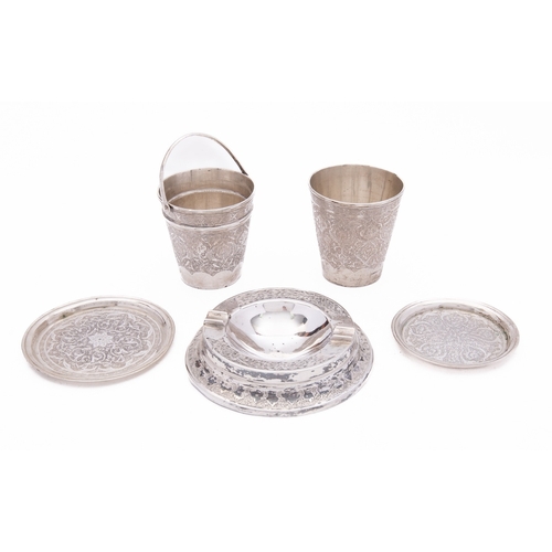 328 - A mid 20th century Iranian silver beaker, Arab script mark, with a small silver ice bucket, two smal... 